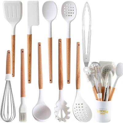 China Stocked Tool Pure White Baking Silicone Cooking Kitchen Utensil Set With Handle Holder Accessories Spatula Turner Ladle Wooden Cookware for sale