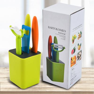 China Viable colorful 4 pcs kitchen knife set with block stainless steel and soft pp handle including paring knives opener peeler &holder for sale