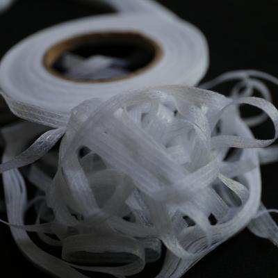 China High quality water soluble nonwoven fusible interlining interface suits WF8525 tape interlining for sale