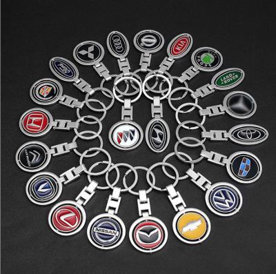 China Retail Promotion Gift Car Rotating Key Chain In Running Hot Sales Customized Logo Car Key Holder Promotional Gift for sale