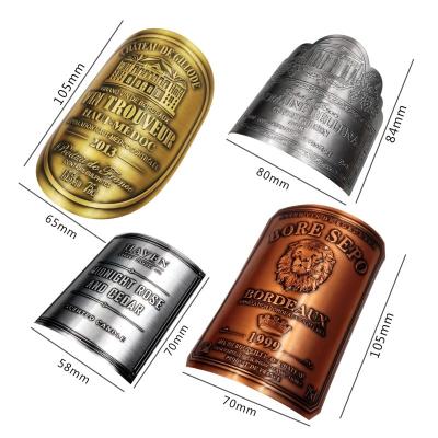 China Wholesale Anti-Counterfeit Tin Wine Label Sticker Adhesive Customized Aluminum Embossed Tin Wine Champagne Burgundy Metal Label for sale