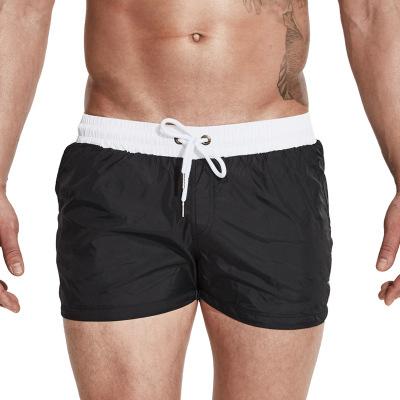 China Anti-wrinkle color slim simple stretch pants bands swim trunk swimsuit panel short beach shorts surf for swimming short beach wear for sale