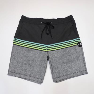 China Summer QUICK DRY High Quality Half Length Pants Breathable Gradient Stripes Gym Shorts Loose Elastic Swim Trunk Men Surf Shorts for sale