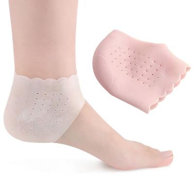 China 2Pcs Silicone Foot Care Foot Pads Moisturize Thin Gel Heel Socks With Cracked Hole Foot Skin Care Protectors Foot Care Tool for sale