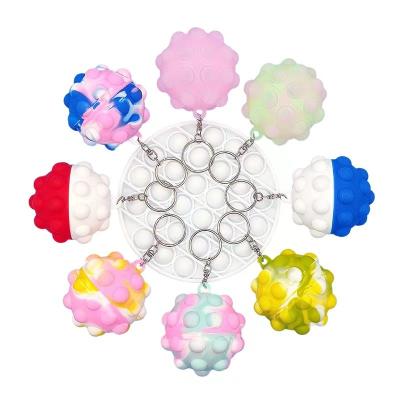 China Decompression Wholesale 6cm Silicone Trigger Wiggle Toy Push Pop Bubble Sensory Squeeze Key Chain Balls Wiggle Toys for sale