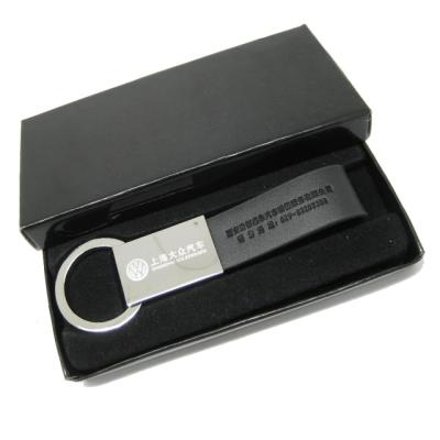 China Custom Eco-friendly Luxury Genuine Black Leather Car Logo Key Chain Tags With Box For Gift for sale