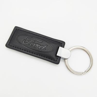 China Eco-friendly custom car logo debossed black leather key chain for promotion gift for sale