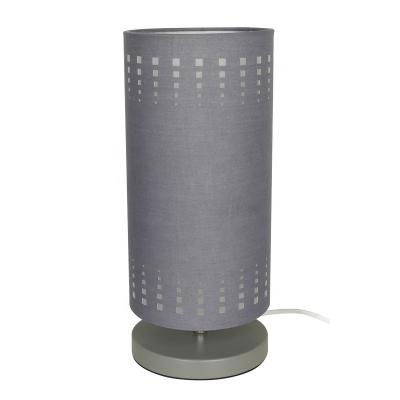 China Modern Fabric Cylindrical Drum Laster Cut Table Lamp For Living Room Hotel Bedroom for sale