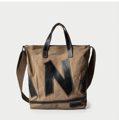 China Large Canvas Handled With Leather Balance Tote Bag Casual Shopping Bag Unisex Shoulder Bag With Letters for sale