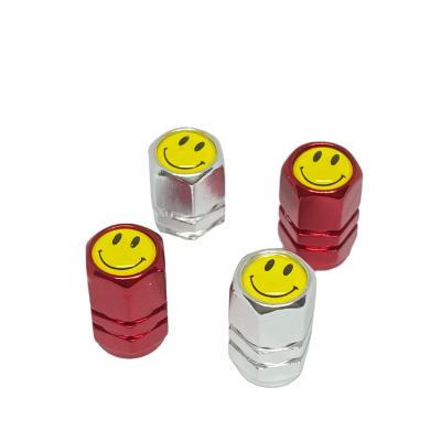 China For Car Colorful Smile Logo Aluminum Brand Tire Valve Covers Stem Cap for sale