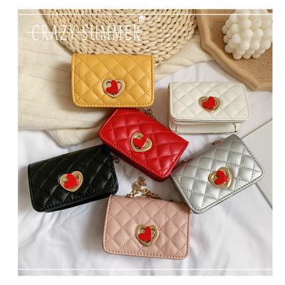 China Fashion little girl shoulder lady bags children handbags clip heart shape decoration gilr children handbags for sale