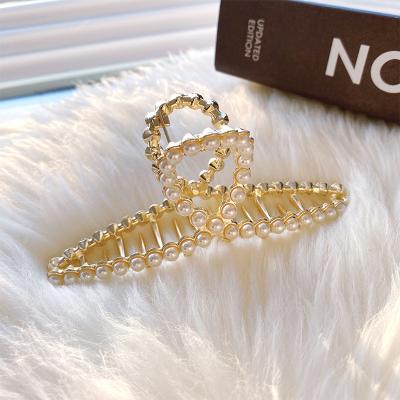 China Fashion Pearl Hairpin Handle Hair Clip Fashion Back Shark Clip Edge Main Hair Clip for sale