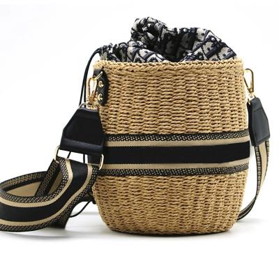 China Fashion New 2022 Summer Women's Handbags Paper Rope Drum Woven One-shoulder Straw Luxury Bags for sale