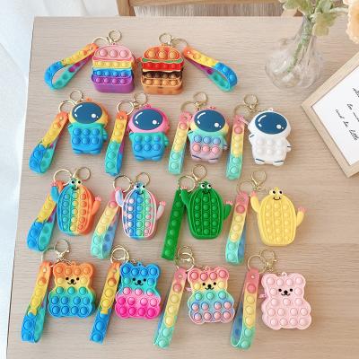 China 2022 New Bubble Silicone Push Bag Handbag Macaron Cactus Astronaut Shaped Pocket Money Bag Silicone Popper Purse Toy It Popped Bag for sale