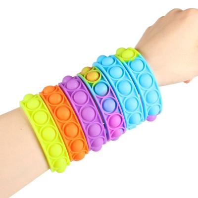 China Popular Children's Toys Design Decompression Finger Stir Wristband Toy Wristband Relax Silicone Pops for sale