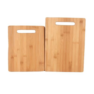 China Sustainable Cheap Price High Density Bamboo Wooden Meat Vegetable Cutting Board With Handle for sale