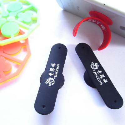 China Non-Toxic Custom Touch U Silicone Cell Phone Holder With Suction Cup for sale