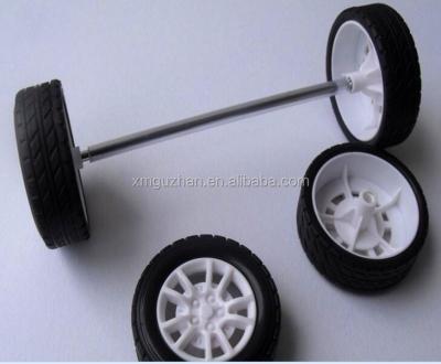 China Eco-friendly White Gray Custom Car Color Rubber Plastic Wheel Toy With Alxe for sale