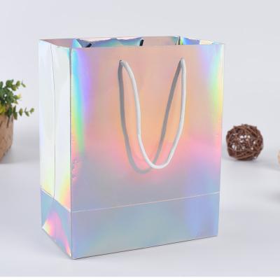 China Good Quality Recyclable Environmentally Friendly Kraft Paper Bag With Handle Holographic Paper Bags for sale