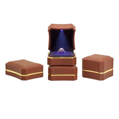 China Wholesale And Retail Classic Styling Box Jewelry Box Custom Manufacturers Wholesale And Retail High End Elegant Luxury Ring Box With Led Light Ring Bag for sale