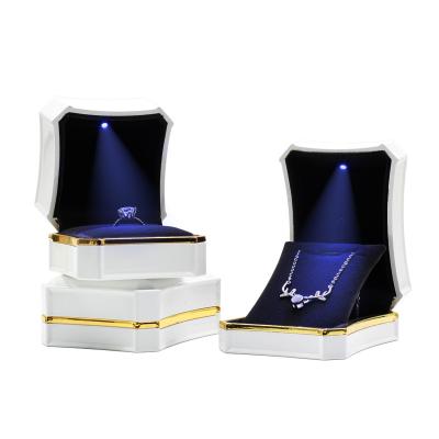 China Classic Styling High End Luxury Ring Box Gold Border Box With Large Led Light Necklace Box Jewelry Box Custom for sale