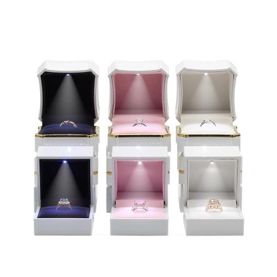 China Newest Wholesale White Luxury Ring Box With Led Light Necklace Jewelry Box Customized Wedding Favor Boxes for sale