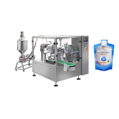 China Juice Filling And Doypack Spout Rotary Pouch Beverage Fruit Machine Capping Liquid Packaging Machine for sale