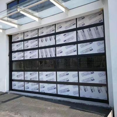 China Modern tempered glass garage sectional doors and clear glass industrial sectional doors in aluminum alloy frame for sale