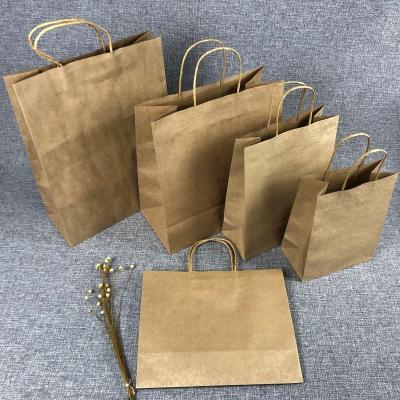 China Biodegradable Brown Kraft Custom Craft Christmas Paper Shopping Bag With Your Own Logo for sale