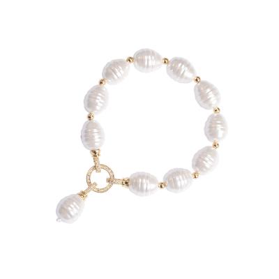 China Trendy Modern Handmade Pearl White Water Beaded Drop Bracelet With Spirals for sale