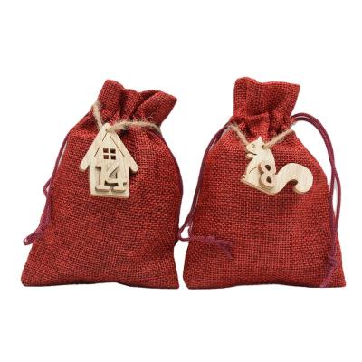 China DIY Jute Advent Calendar Christmas Countdown Advent Calendar Bags with Wooden Hanging Drawstring Burlap Gift Bag for sale