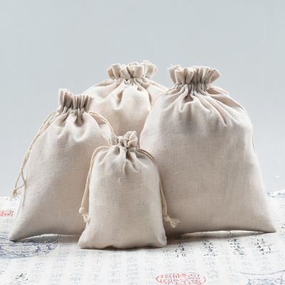 China Recyclable Custom Logo 100% Natural Cotton Canvas Bags Reusable Small Cotton Dust Proof Drawstring Pouch Muslin Cotton Rope Bags for sale