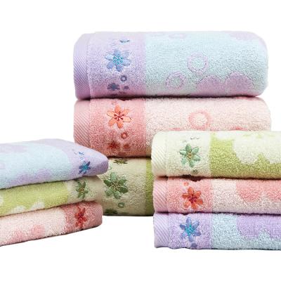 China Custom 100% Sustainable Cotton Yarn Dyed Jaquard Embroidery Terry Towel Hand Face Bath Towels for sale