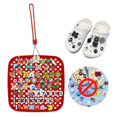 China Wholesale Charm Croc Charms Shoe Decorations Organizer Portable Shoe Charm Roll Storage Silicone Hanging Display Stand for sale