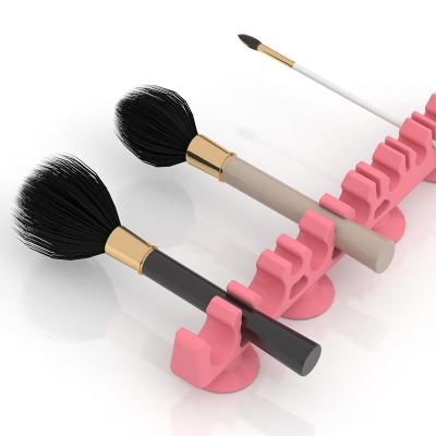 China 2021 New Arrivals Silicone Brush Holder Organizer Dry Hanger Silicone Cosmetic Makeup Brush Drying Rack for sale