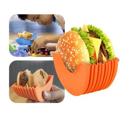 China Amazon Success BPA Free Expandable Reusable Silicone Stretchable Hamburger Buns Cup Holder for sale