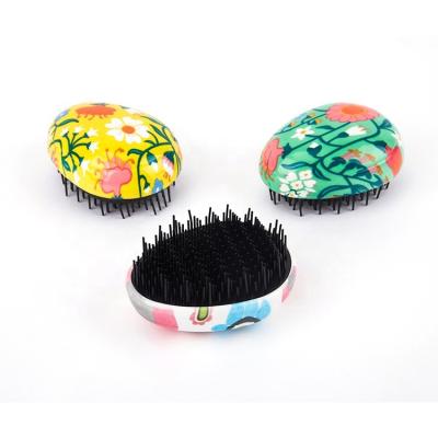 China Home/Gift/Water Transfer New Promotion Technology Printing Mini Comb Detangling Hair Brush Promotional Gift for sale