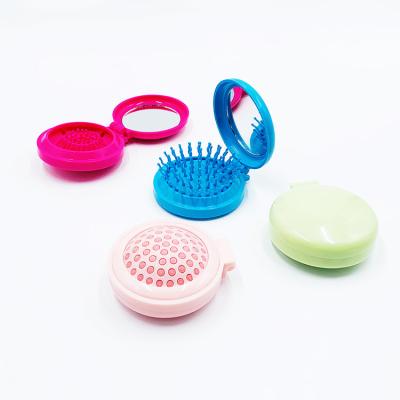 China Comb+mirror Foldable Travel Airbag Hair Brush Mirror Portable Small Size Foldable Comb for sale