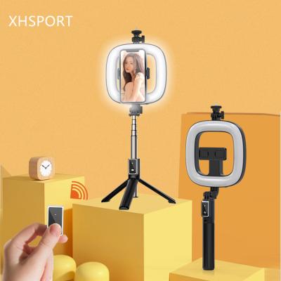 China Live Broadcast Portable Mobile Phone Selfie Stand Tripod Portable Dismountable Remote Control Holder for sale