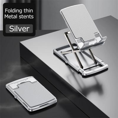 China Multi-angle Adjustment Adjustable Desktop Aluminum Alloy Metal Foldable Mini Tablets Standing Mobile Phone Stand Holder for sale