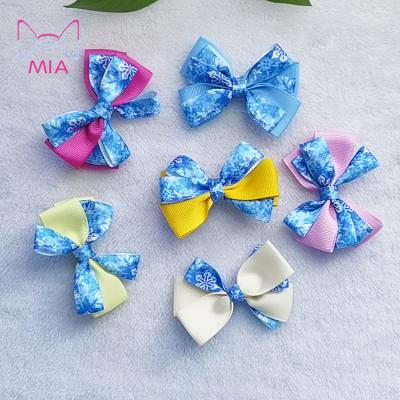 China 3 Inch Sweet Handmade Snowflake Print Ribbon Clip Princess Hair Bow With Clip For Babies for sale