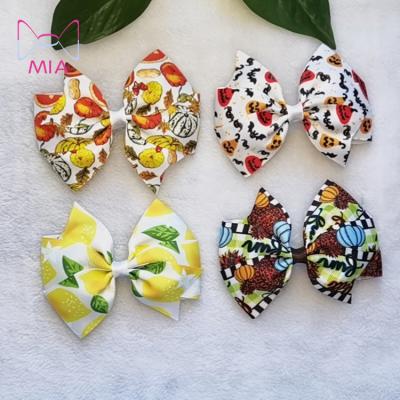 China Fashionable 4.5 Inch Printed Ribbon Autumn Hair Bow Beautiful For Kids Hair Accessories for sale