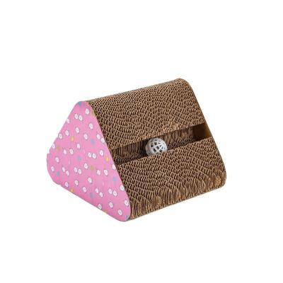 China Durable Interactive Indoor Cardboard Cat Scratcher Pad Viable Classic Pink Triangular Prism Design with 1 Ball for sale