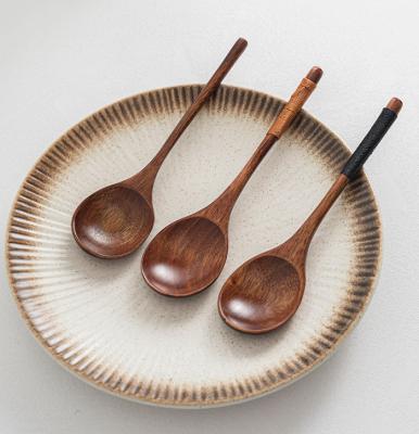 China Factory Price Sustainable Professional Curved Handle Nanmu Products Mini Wooden Spoon Kitchenware For Sale for sale