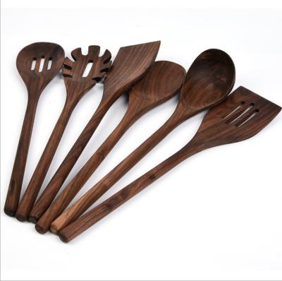 China Stocked Custom Wholesale Teak Wooden Kitchen Utensils Set Black Walnut Wooden Accessories Kitchen Tableware Cooking Tool Kits for sale