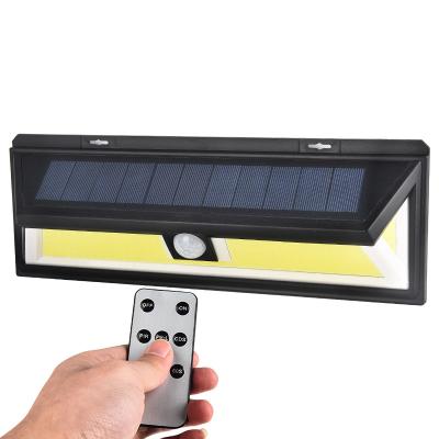 China Polycarbonate IP65 Outdoor Waterproof Triggered Wall Lamp with Remote Control Solar COB Wall Light Motion Sensor Light for sale