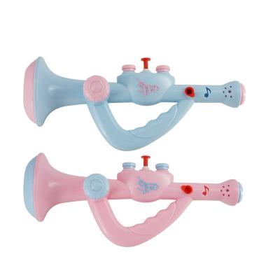 China Plastic Summer Outdoor Game 2 In 1 Mini Music Trumpet Toy Horn Shape Water Spray Gun With Musical Instrument Candy Toys for sale