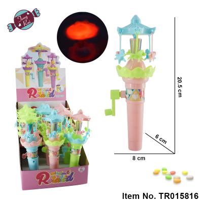 China Candy toys for kids 2021 new high quality plastic pop-up toys with candy hand promotion toy the little carousel pop-up toy shake for kids for sale