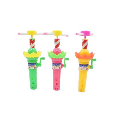 China Plastic Manual Lighting Spinning Top Toy Candy for sale