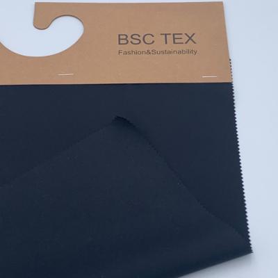 Cina Tessuto di nylon dell'elastam 10 di 20D X 30D Matte Nylon Fabric 90 antivento elastico in vendita